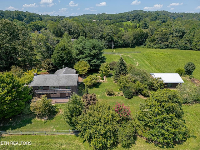 birds eye view of property featuring a rural view