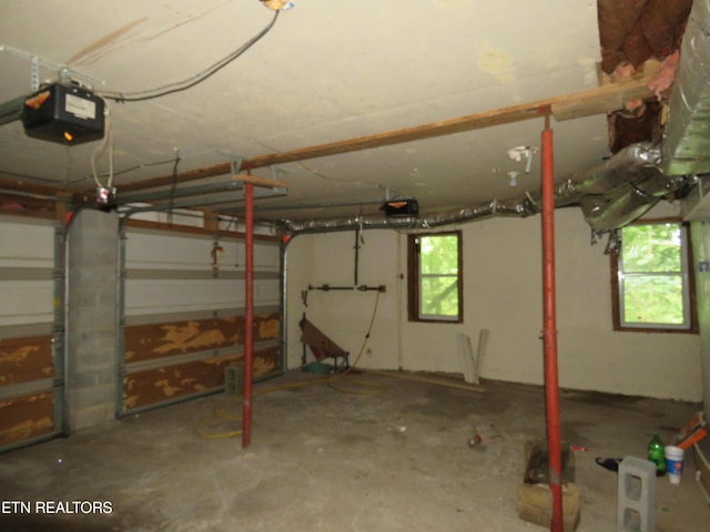 garage featuring a garage door opener