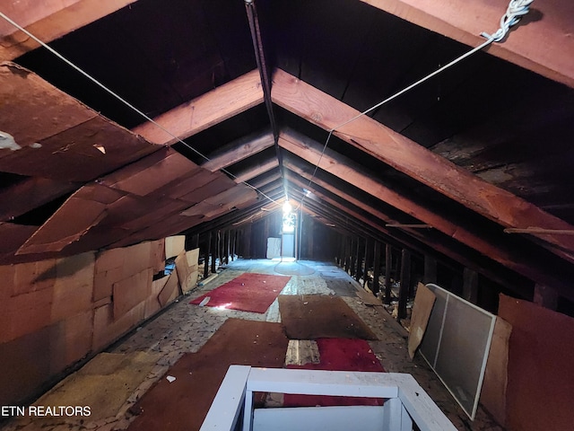 view of unfinished attic