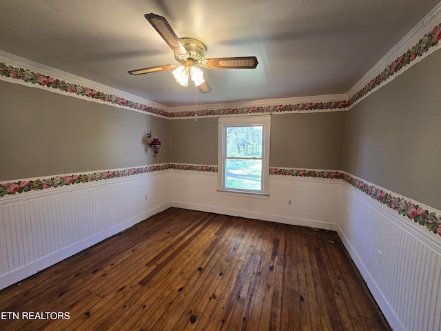 209 Greenwood Ave, Pennington Gap, VA 24277 - unfurnished room with wainscoting, dark wood-type flooring, ceiling fan, and crown molding