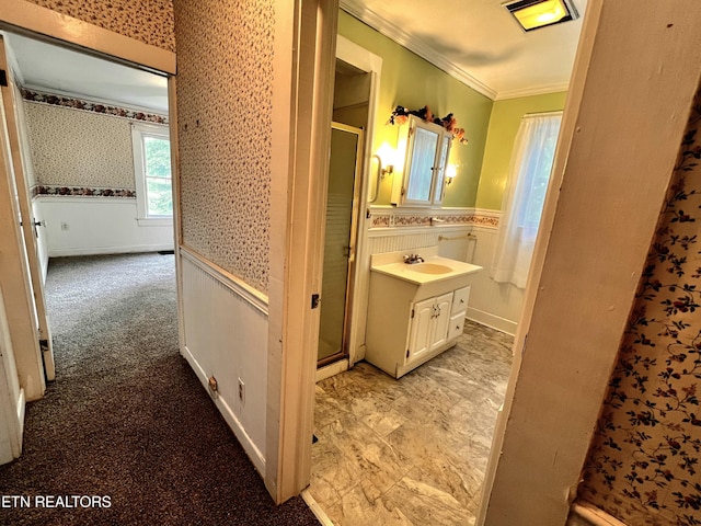 209 Greenwood Ave, Pennington Gap, VA 24277 - bathroom with wallpapered walls, a wainscoted wall, a stall shower, vanity, and crown molding
