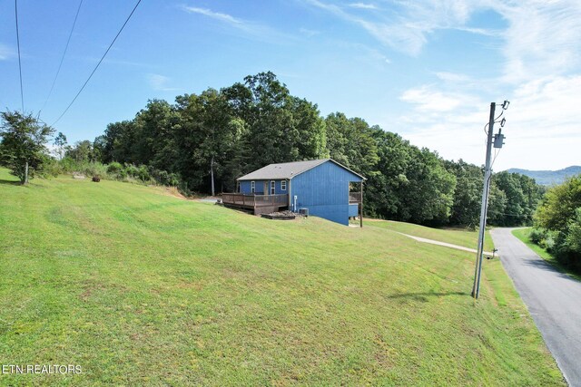 view of yard featuring a deck