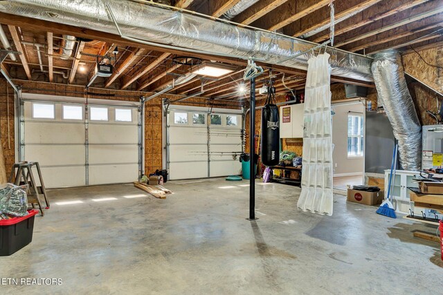 garage featuring electric water heater