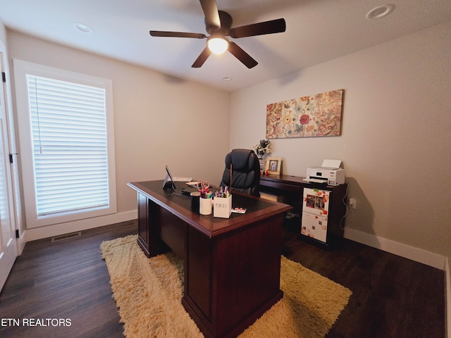 office space with ceiling fan and dark wood-type flooring