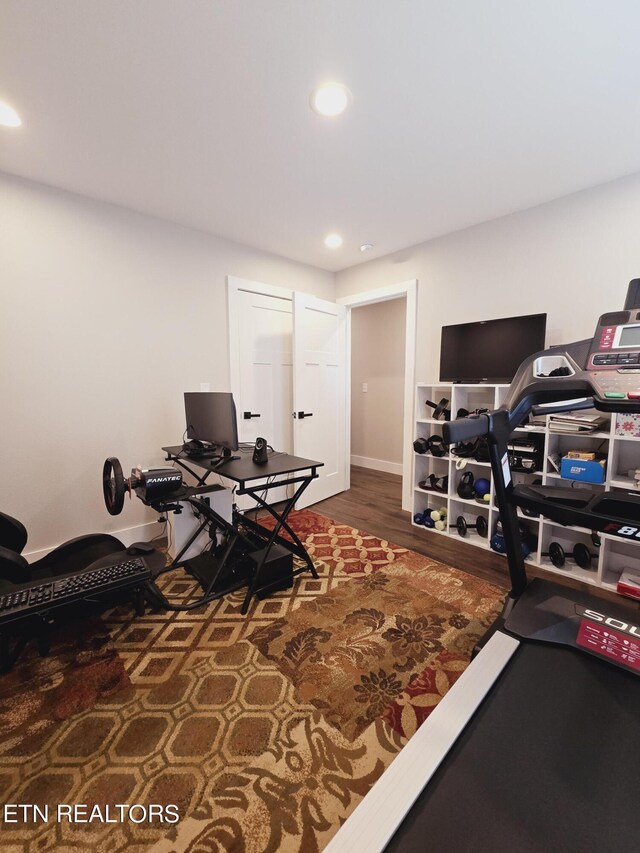 office area with dark wood-type flooring