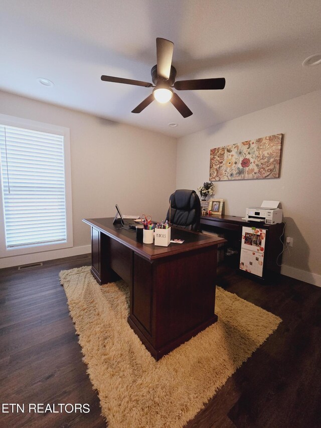 office featuring dark wood-type flooring and ceiling fan