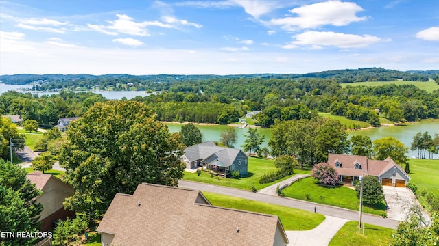 drone / aerial view with a water view