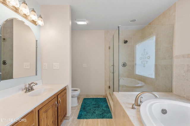 full bathroom featuring tile patterned floors, vanity, toilet, and separate shower and tub