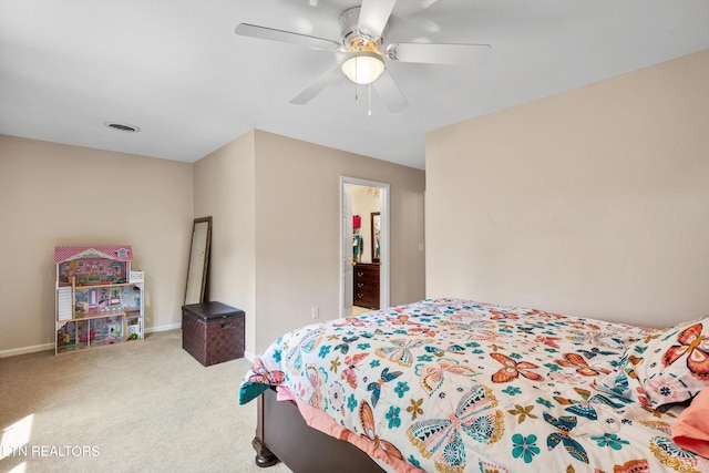 bedroom with ceiling fan and carpet flooring