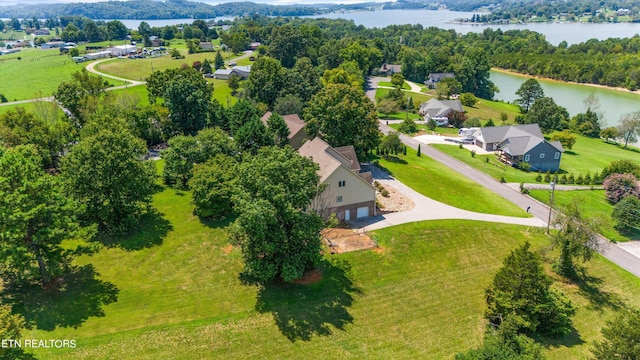 drone / aerial view with a water view