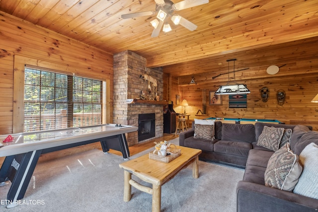 carpeted living room with wood ceiling, wood walls, billiards, ceiling fan, and a fireplace