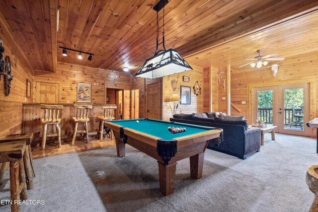 game room with carpet floors, bar, billiards, and rail lighting