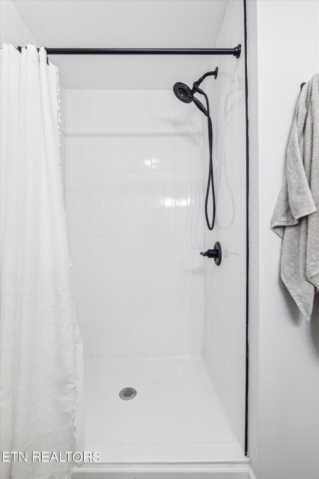 bathroom with walk in shower