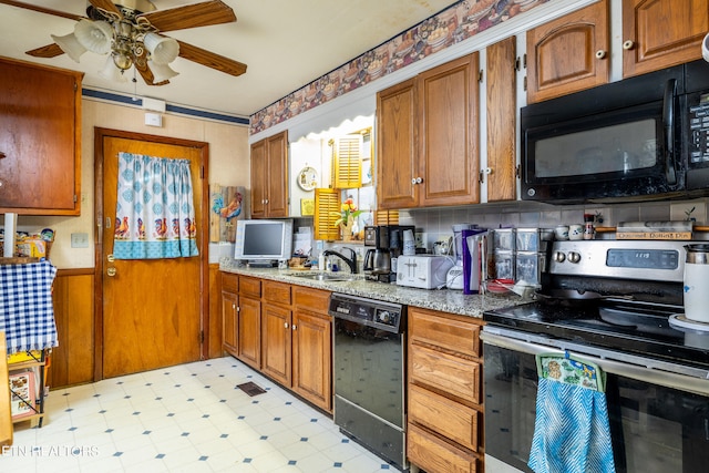 kitchen with black appliances, light tile patterned flooring, sink, ceiling fan, and decorative backsplash