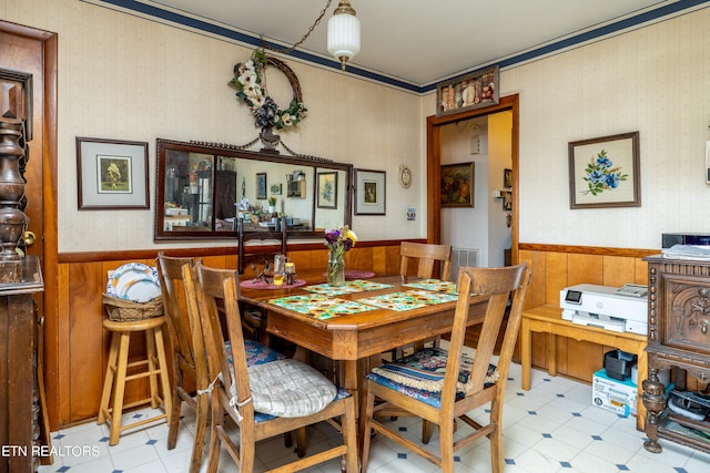 dining area with light tile patterned floors