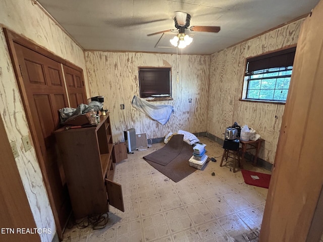 unfurnished bedroom featuring ceiling fan and light tile patterned floors