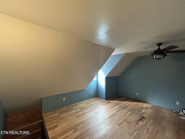 bonus room featuring ceiling fan, wood-type flooring, and lofted ceiling