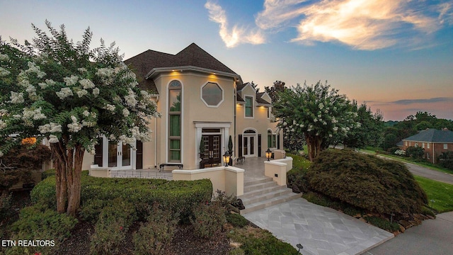 view of front facade featuring french doors