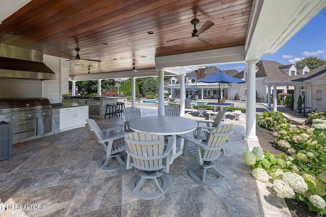 view of patio / terrace featuring ceiling fan, grilling area, and area for grilling