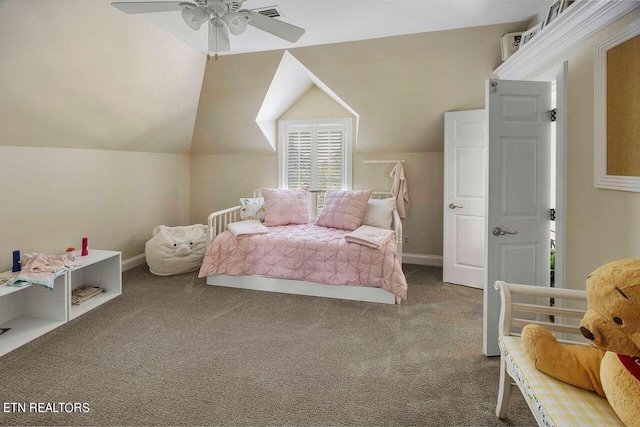 carpeted bedroom with ceiling fan and vaulted ceiling