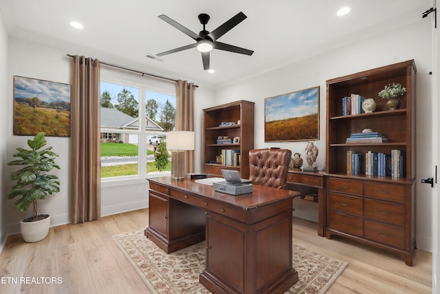 office space featuring light wood-type flooring, recessed lighting, visible vents, and ceiling fan