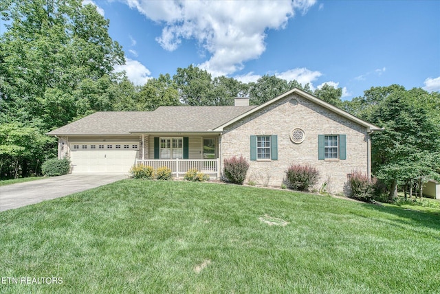 ranch-style home featuring a garage, driveway, a chimney, a porch, and a front yard