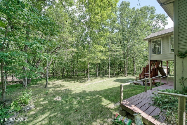 view of yard featuring a deck