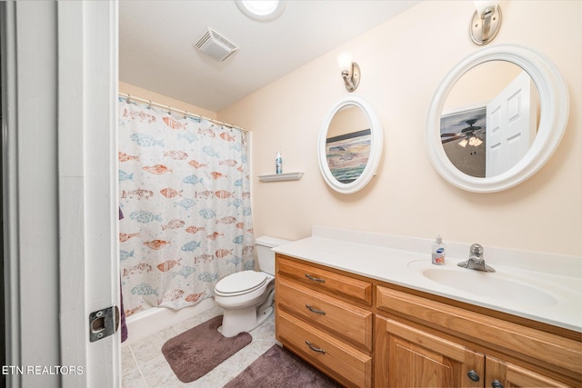 bathroom with curtained shower, toilet, vanity, visible vents, and tile patterned floors