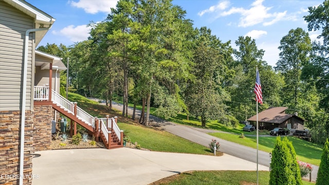 exterior space featuring a lawn