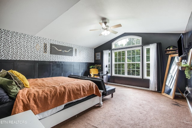 carpeted bedroom with ceiling fan and lofted ceiling