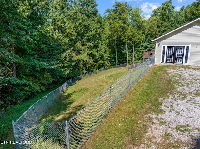 view of yard with french doors