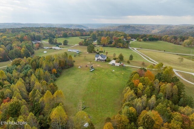 birds eye view of property featuring a rural view