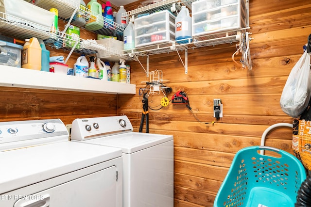 washroom featuring washer and dryer and laundry area