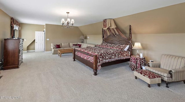 bedroom with a notable chandelier, lofted ceiling, and light colored carpet