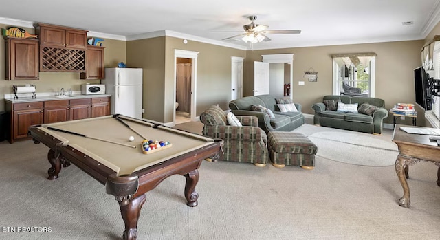 recreation room with light carpet, pool table, crown molding, and ceiling fan