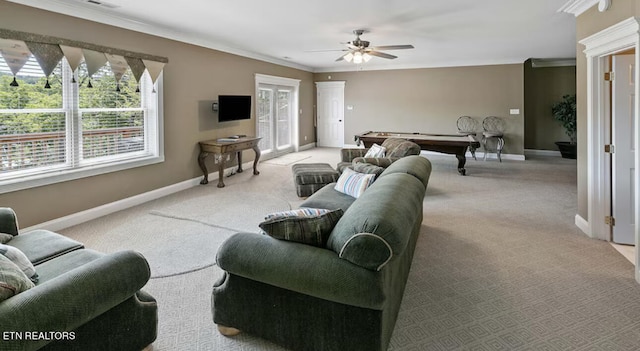 carpeted living room with ceiling fan, pool table, a healthy amount of sunlight, and ornamental molding