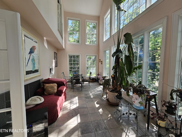 sunroom / solarium featuring a healthy amount of sunlight