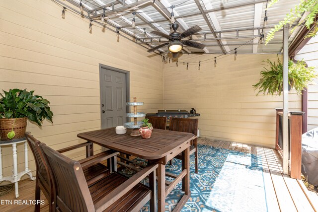 exterior space with ceiling fan and a pergola