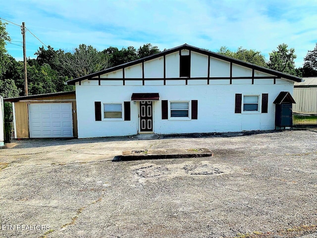 view of front of property with a garage