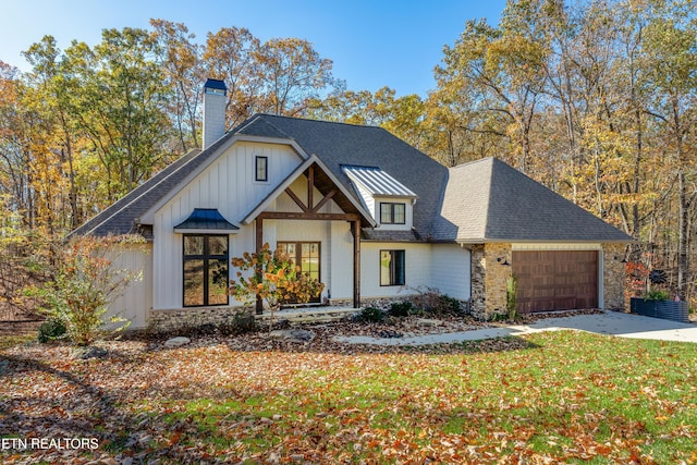 view of front of property featuring a garage