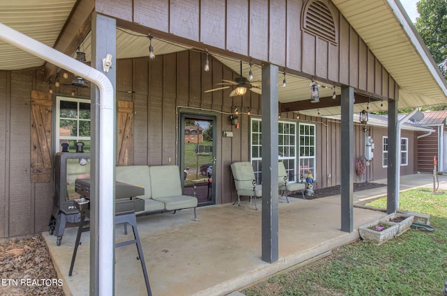 view of patio with ceiling fan