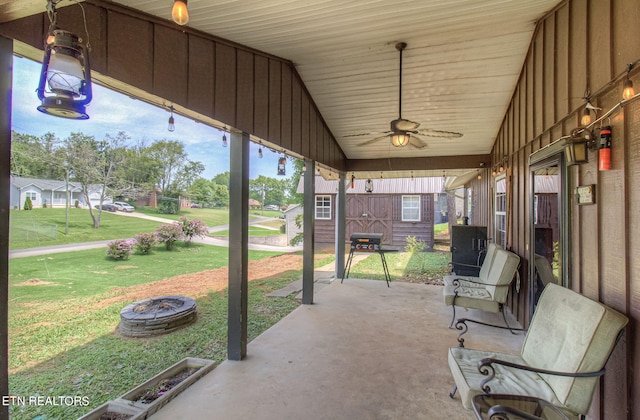 view of patio with ceiling fan