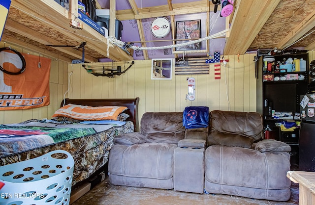 bedroom with wooden walls