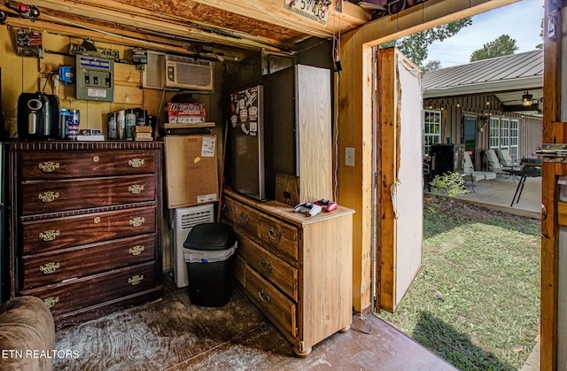 interior space with a wall mounted AC