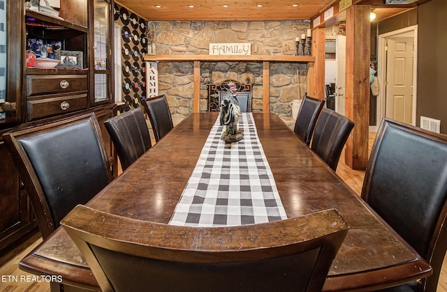 dining space featuring hardwood / wood-style floors