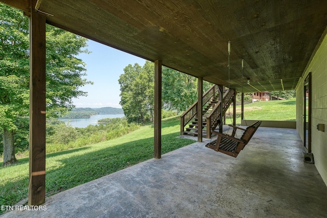 view of patio / terrace featuring a water view