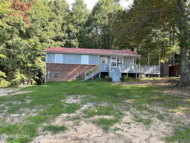 exterior space with a front yard