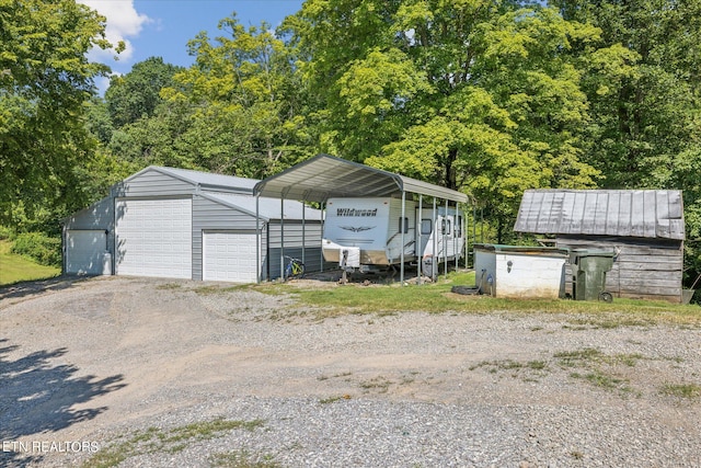 garage featuring a carport