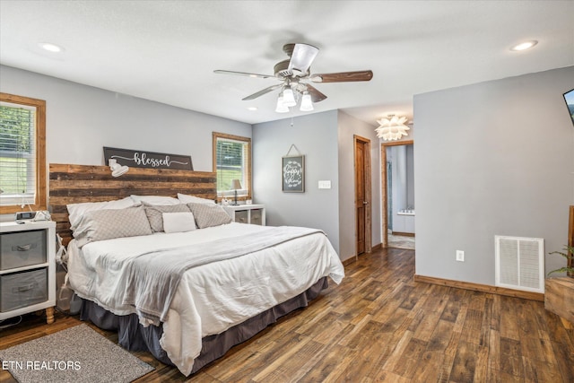 bedroom featuring ceiling fan and dark wood-type flooring