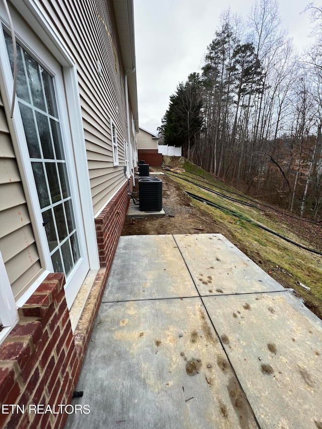 view of patio featuring central air condition unit